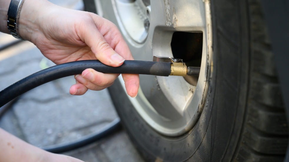 inflating car tyre